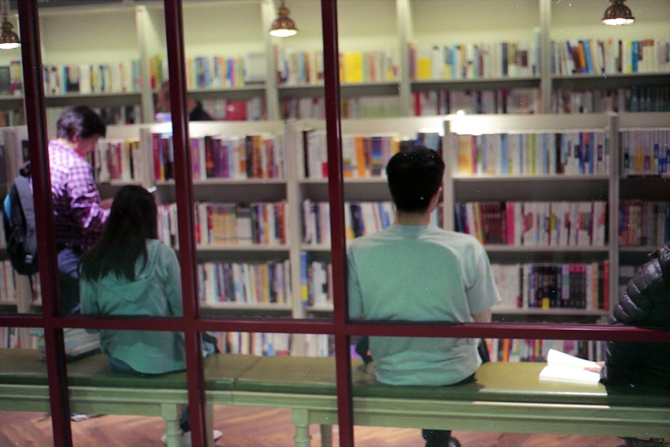 Capture of a vibrant bookstore interior with customers exploring aisles of books.