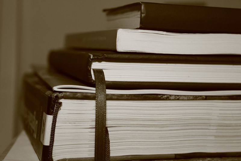 Stack of English novels for extensive reading vocabulary practice