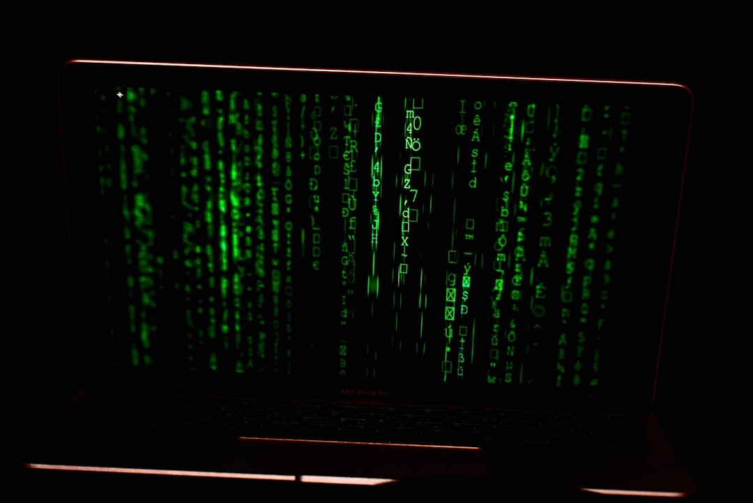 image du code informatique vert sur un écran noir qui gère la réalité perçue de la Matrice