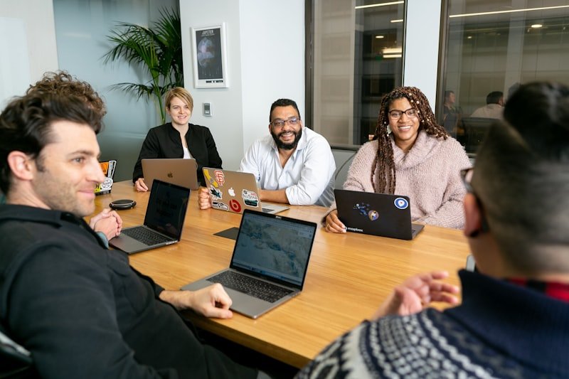 board meeting discussing data charts in 英文簡報 setting