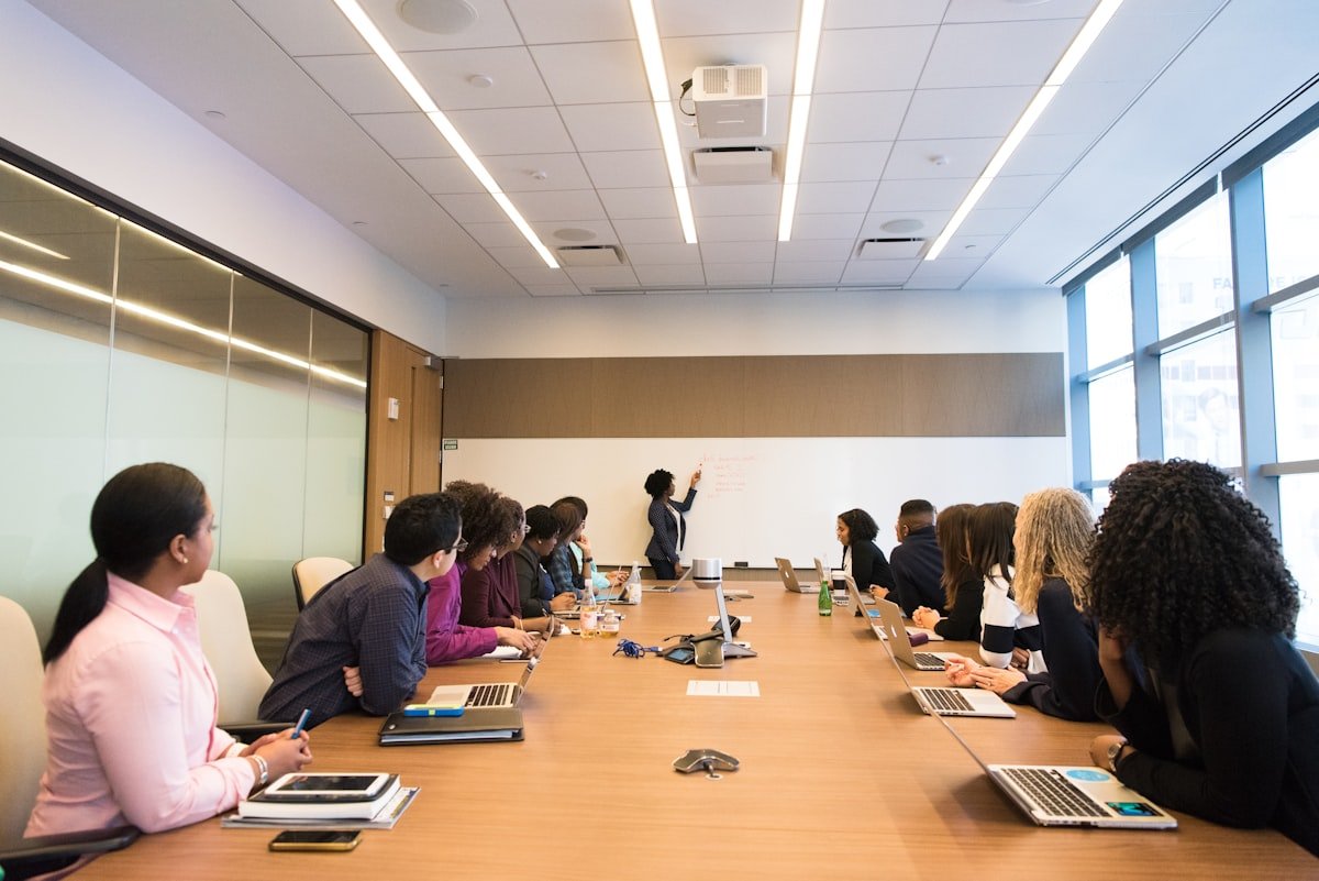 Negotiation English business team discussion in boardroom