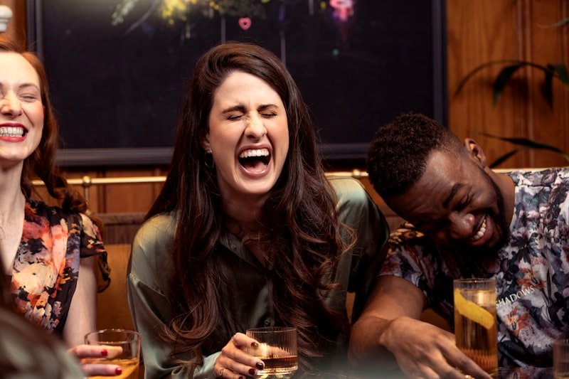 People laughing together small talk English conversation