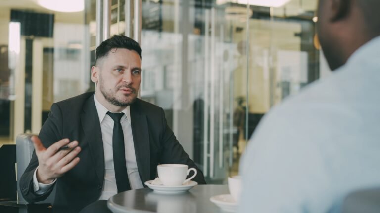 Two professionals discussing how to refuse a request in English politely
