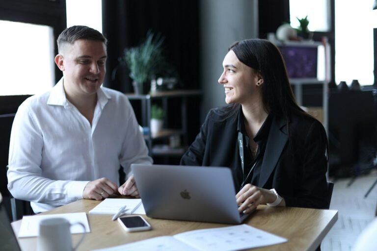Two Taiwan professionals using reported speech in an office conversation