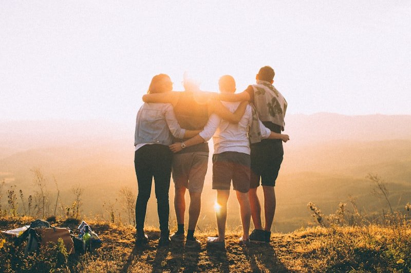 Group of friends at sunset practicing natural American slang