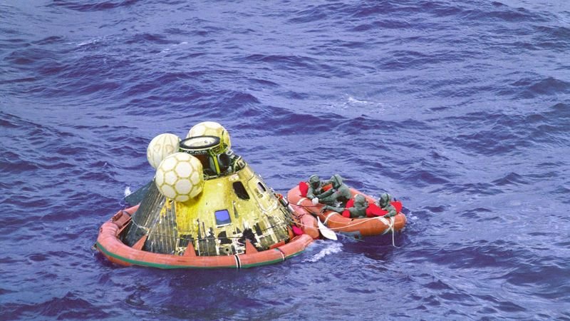 Apollo 11 crew including Michael Collins after splashdown in the Pacific Ocean