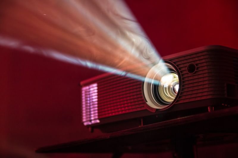 Home projector playing an English series for immersive English practice