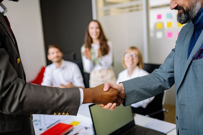 Handshake closing a meeting after agreeing action items
