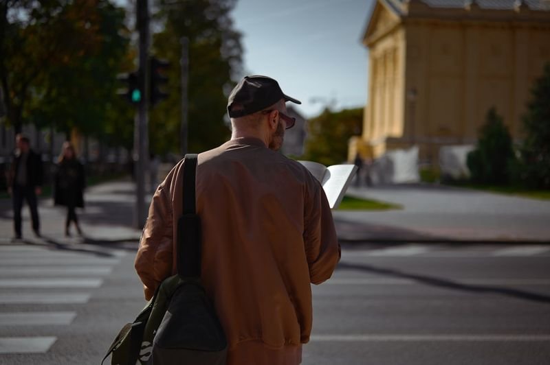Traveler using English conversation to ask for directions in a city