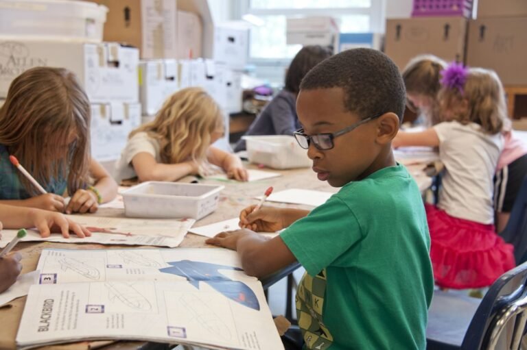 Students taking the PISA international assessment test at school