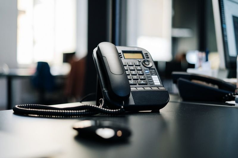Office desk telephone used for English phone calls at work