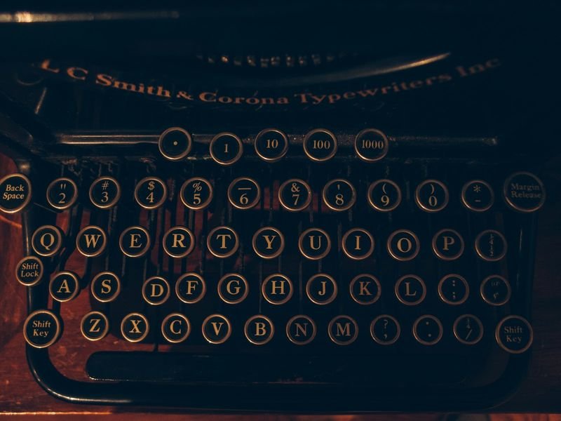 Vintage typewriter keys showing English punctuation marks