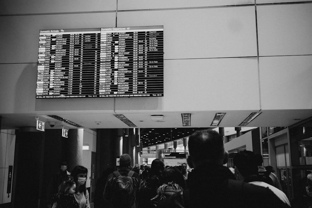 Departure board in airport - Brisbane, Australia.