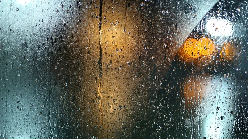 Rain splashing on window showing nature onomatopoeia sounds