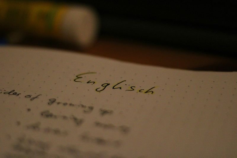 Studying English punctuation rules with desk notes