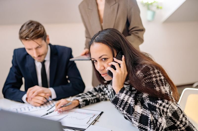 Business team in a formal meeting, illustrating call to order and call the shots