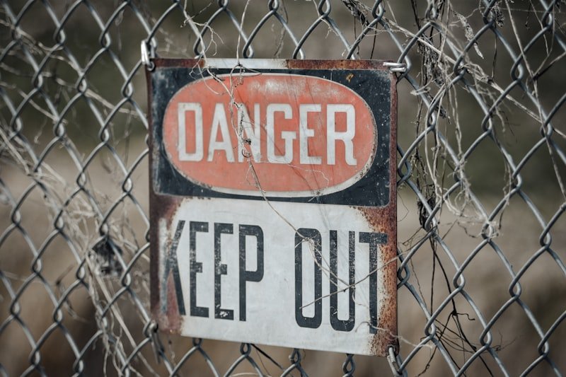 keep out phrasal verb door boundary closed English
