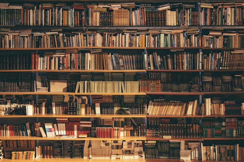 Library shelves with books — studying resources for mastering commonly confused English words