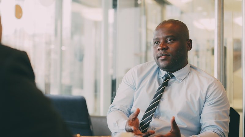 make up for phrasal verb English — businessman explaining a plan to his partner