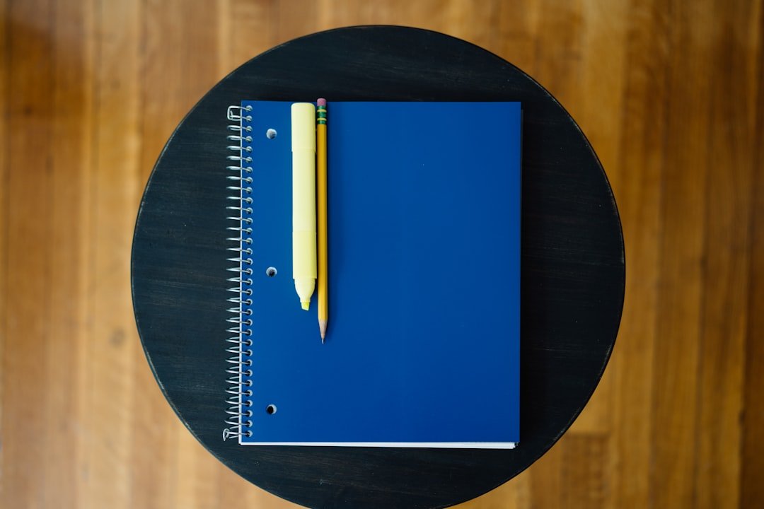 notebook with a pencil and eraser on it