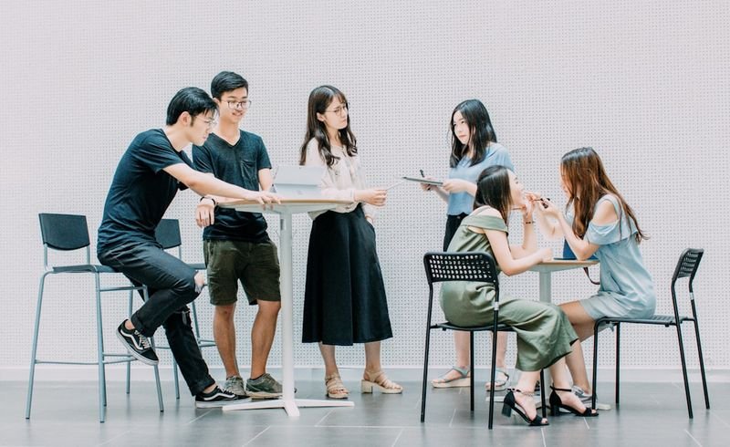 people practicing English tag questions together