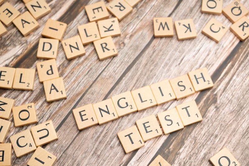 Scrabble letters spelling out English words grammar practice perfect modal verbs