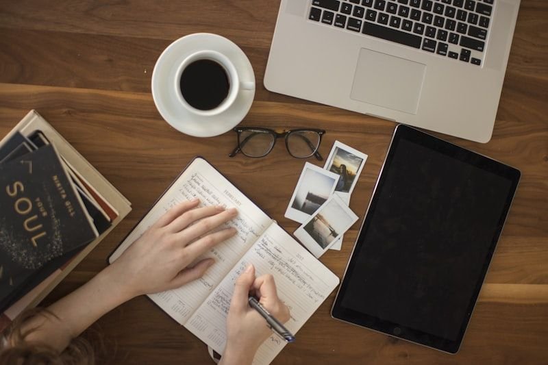 Person writing notes on grammar — practicing English spelling traps like everyday vs every day